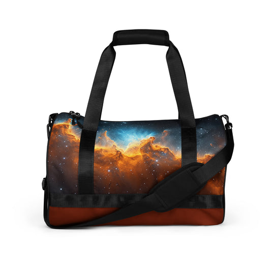 Blue and gold nebula star formation rust colored duffel bag or gym bag shown from the front. Gym bag for men or gym bag for women