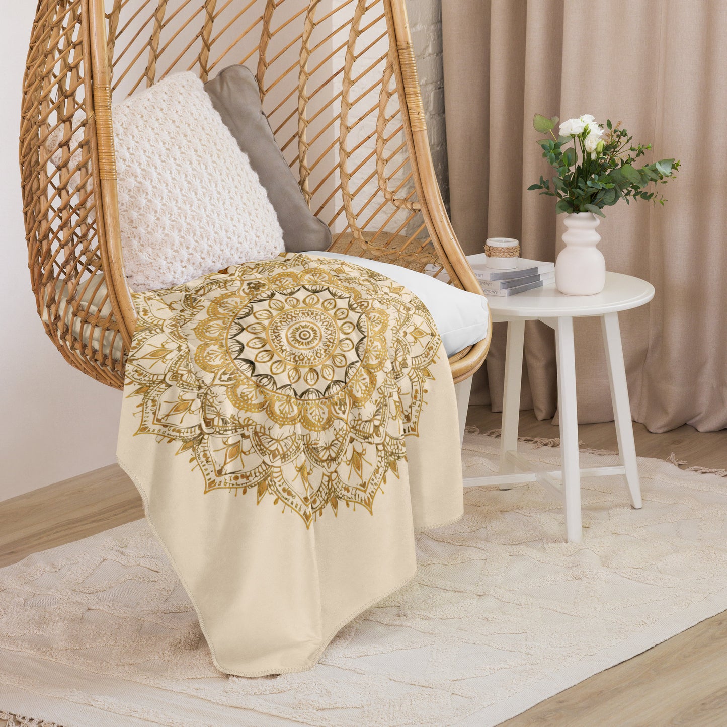 Large gold mandala on a plush sherpa blanket, soft, cozy blanket, shown in small size, on a chair